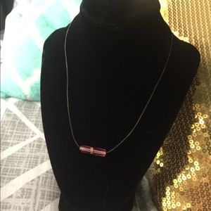 Pink bead/ leather cord